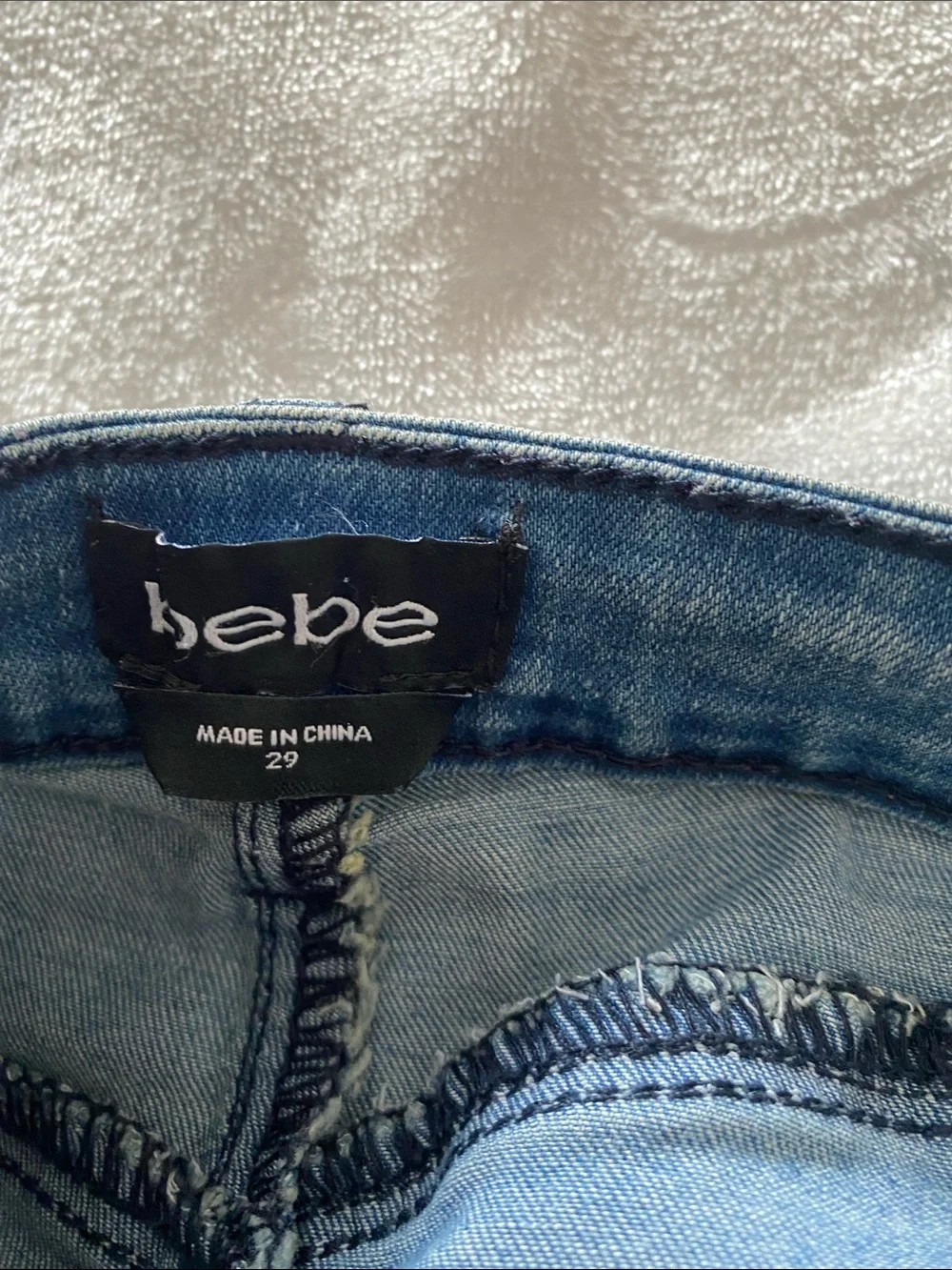BEBÉ  Skinny Jeans in Faded Blue Stretch. Size 29